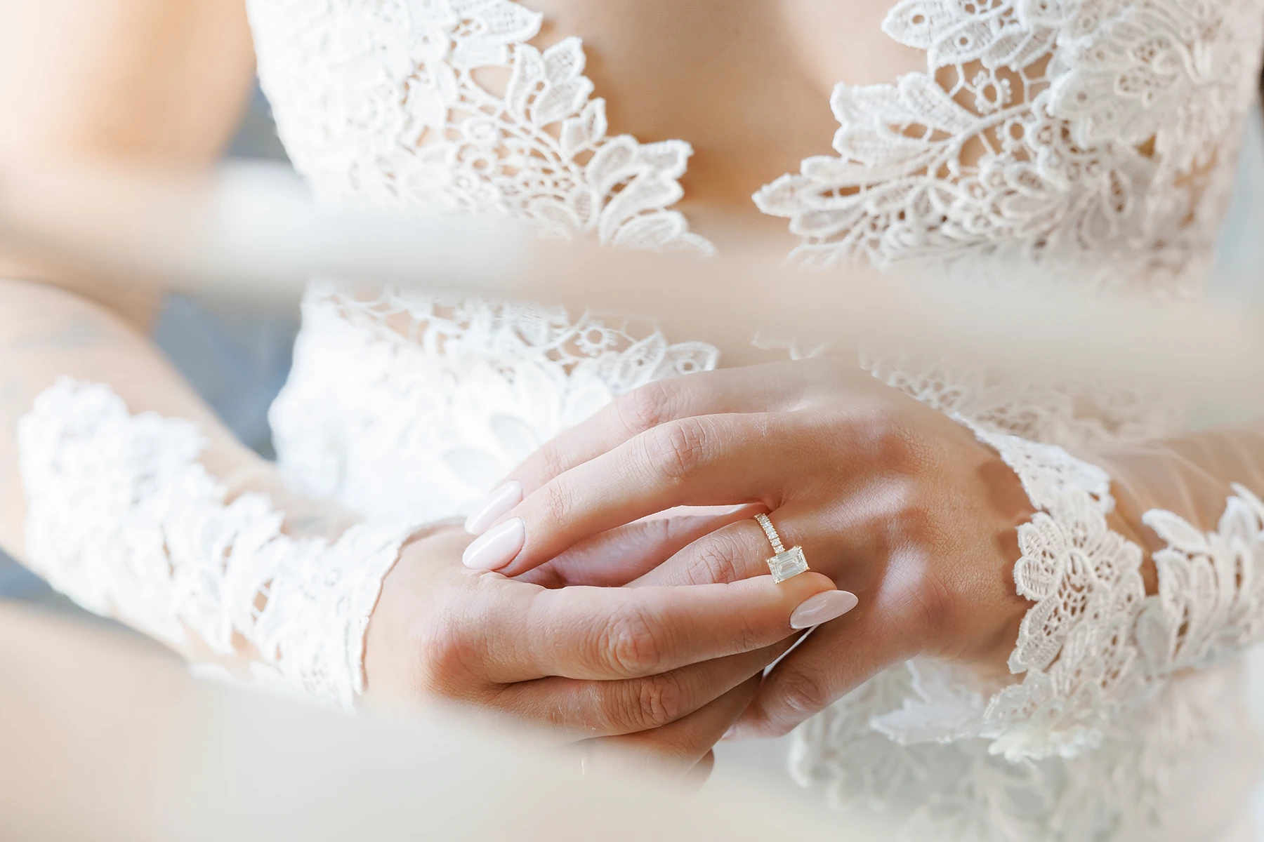 Bride's hands with engagement ring - Wilmington, NC prenuptial agreements lawyer